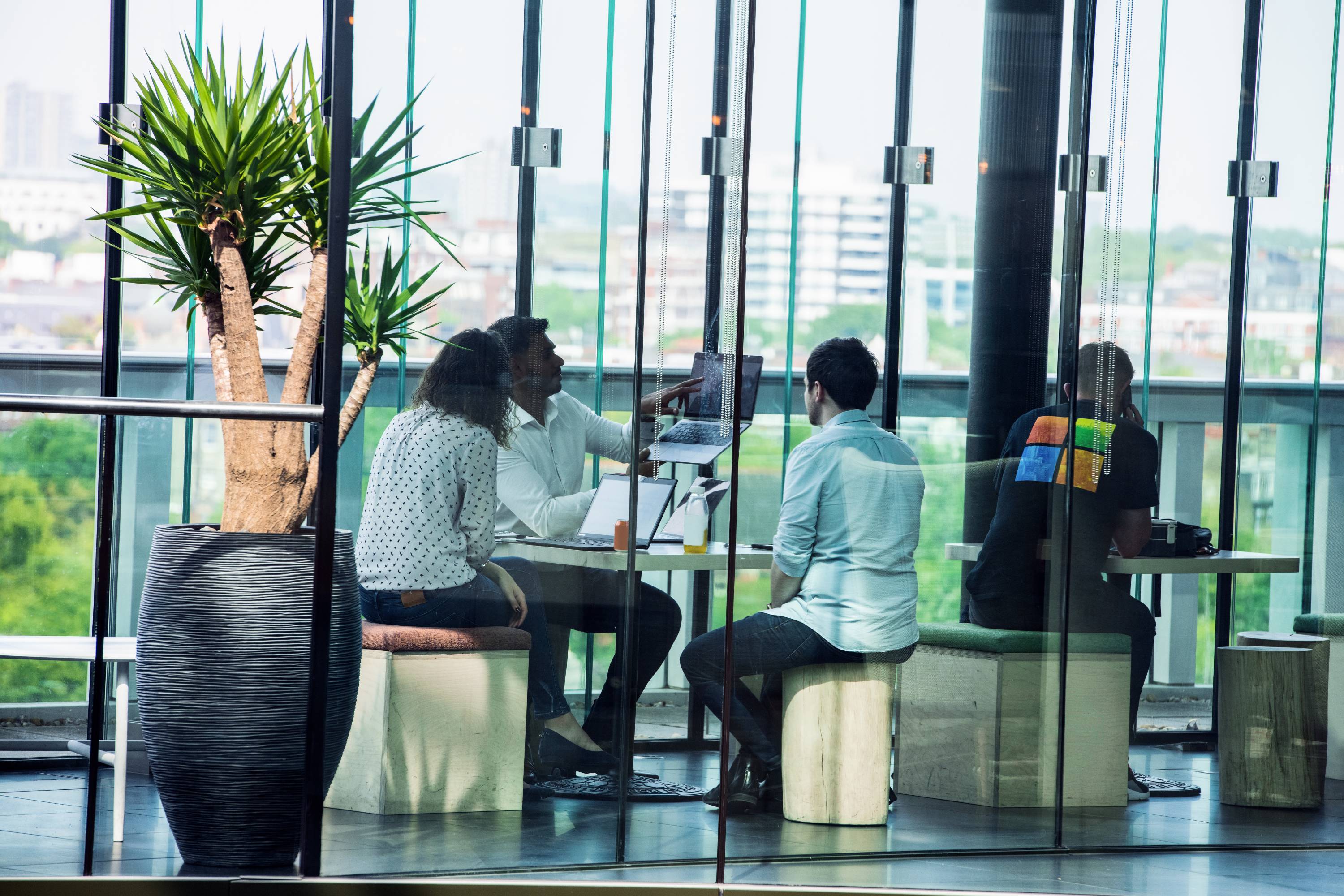 People in meeting room working